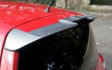 The huge rear wing has little aero benefit but lifts the Twingo's looks Renault Twingo RS roof spoiler