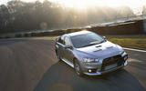 Mitsubishi Lancer Evolution vs. Subaru WRX STI Mitsubishi Lancer Evolution vs. Subaru WRX STI