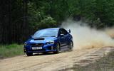 Mitsubishi Lancer Evolution vs. Subaru WRX STI Mitsubishi Lancer Evolution vs. Subaru WRX STI