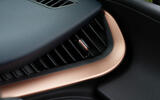 Close-up shot of bronze detailing on the dash of the CUPRA Tavascan