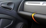 There are some cheap plastics in the ForTwo, not least around the door handle and arm rest Smart Fortwo cheap plastic dashboard