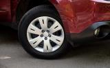 These look like alloy wheels but they're actually steel wheels with plastic trims Subaru Forester plastic hub caps