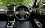 The dark plastic and iffy seat fabrics are a far cry from the modern-looking cabins of rivals Subaru Forester dashboard