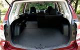 Rear seats drop at the push of a button to create a reasonably capacious boot Subaru Forester boot space