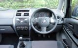 Less is more: simple facia impresses but cheap plastics let down well kitted cabin Suzuki SX4 dashboard