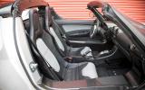 Tesla-branded seats are essentially the same items you’ll find in the Elise Tesla Roadster interior