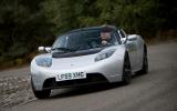 Extra weight means the ride can be a little inflexible at times Tesla Roadster cornering