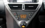 Dashboard design and materials are fully in keeping with the iQ’s pricing point Toyota iQ centre console