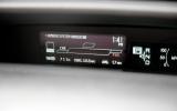 Instrument screen houses digital speedo plus fuel and battery gauges Toyota Prius digital information cluster