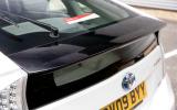 A separate, slender rear window sits under the rear spoiler. Helps with aerodynamics, not visibility Toyota Prius rear spoiler