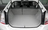 Rear seats fold to sit level with the high boot floor, which has a tray beneath it Toyota Prius boot space