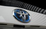 While Toyota doesn't usually stand for cutting-edge designs, the Prius features lots of neat details Toyota hybrid badging