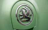 Big body-coloured boot handle looks and feels expensive Vauxhall badging