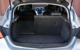 Rakish rear trims boot to a modest 370 litres in the hatchback. Seats folded, it offers 1235 litres Vauxhall Astra boot space