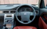 Simple-looking instruments contain LCD displays with bar-graph fuel gauge Volvo V70 dashboard
