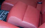 Dual-height child booster seats fold into rear seat Volvo V70 child booster seat