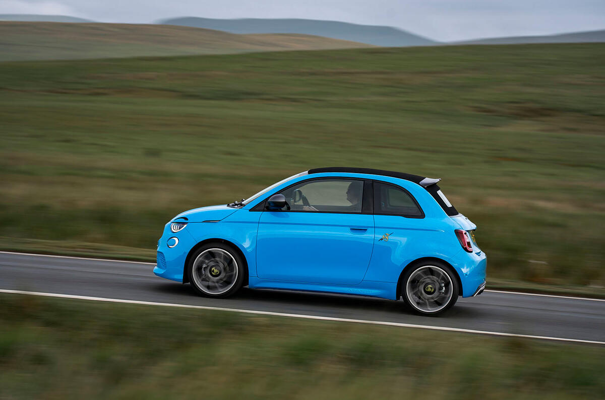 00105 Abarth 500e Convertible UK FD 2023 side driving 00105 Abarth 500e Convertible UK FD 2023 side driving