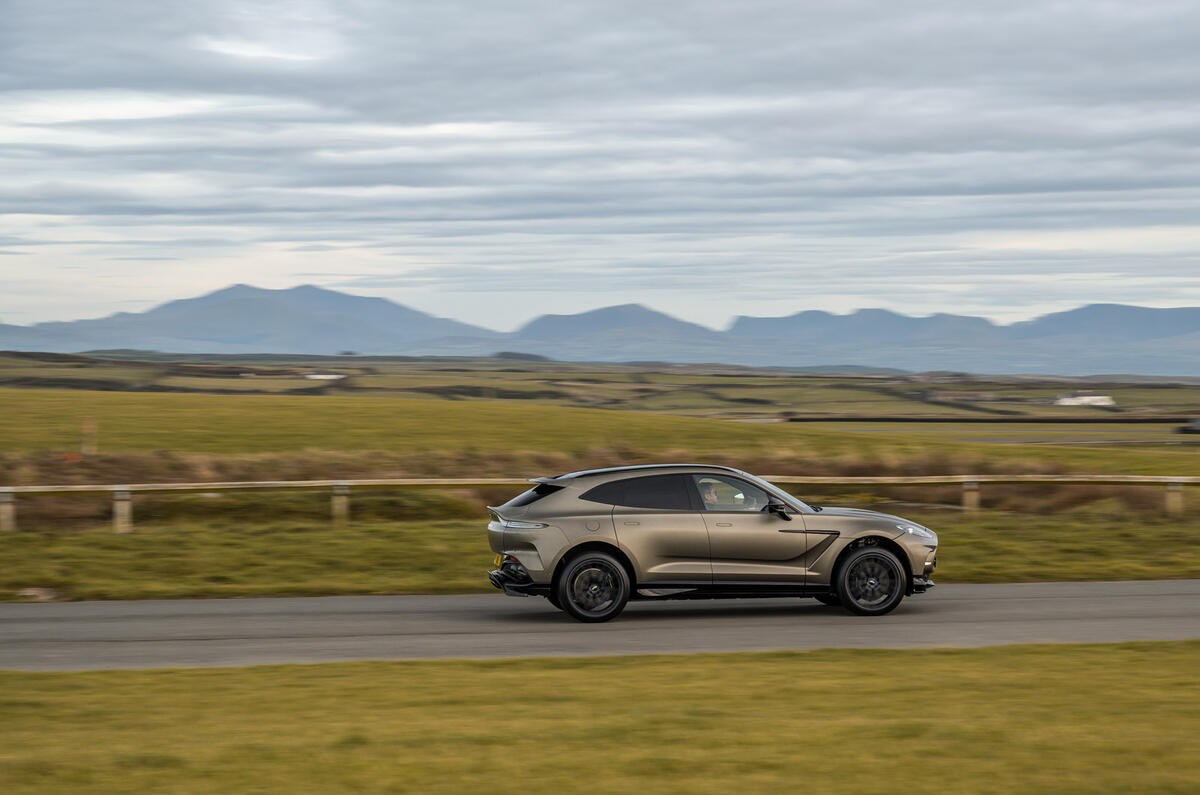 04 Aston Martin DBX 707 RT 2022 side driving 04 Aston Martin DBX 707 RT 2022 side driving