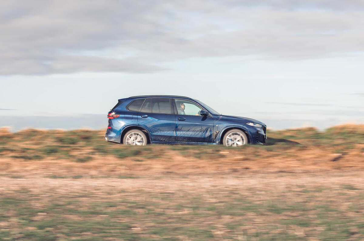 04 BMW X5 xDrive50e review 2024 side driving