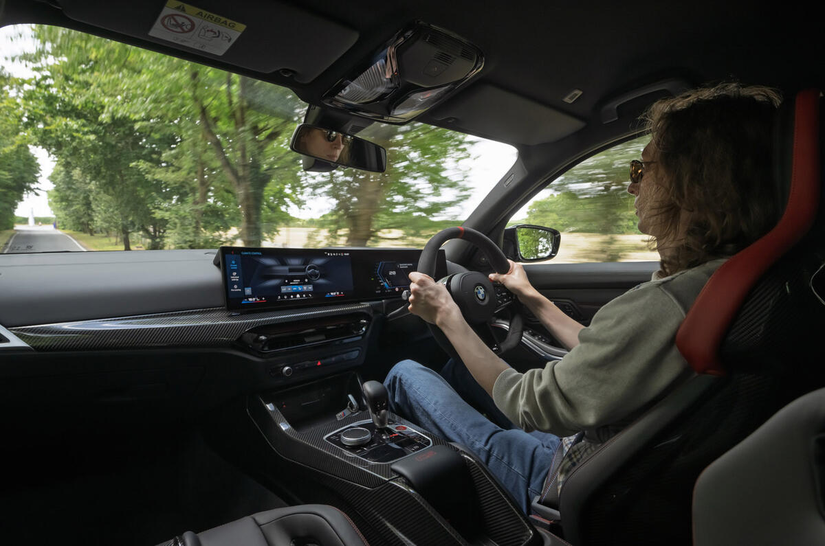 09 BMW M3 CS Touring 2025 Autocar review interior IV driving 09 BMW M3 CS Touring 2025 Autocar review interior IV driving