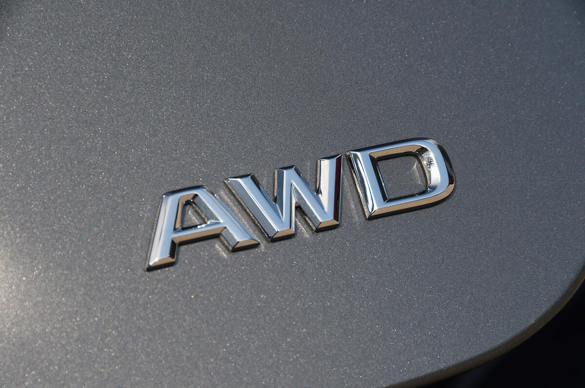 Lexus LS500h 2018 road test review AWD badge