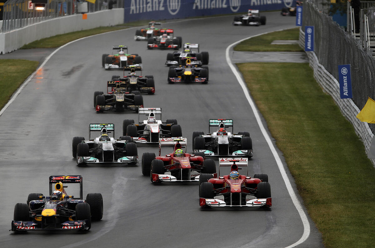 Button triumphs in Canada classic