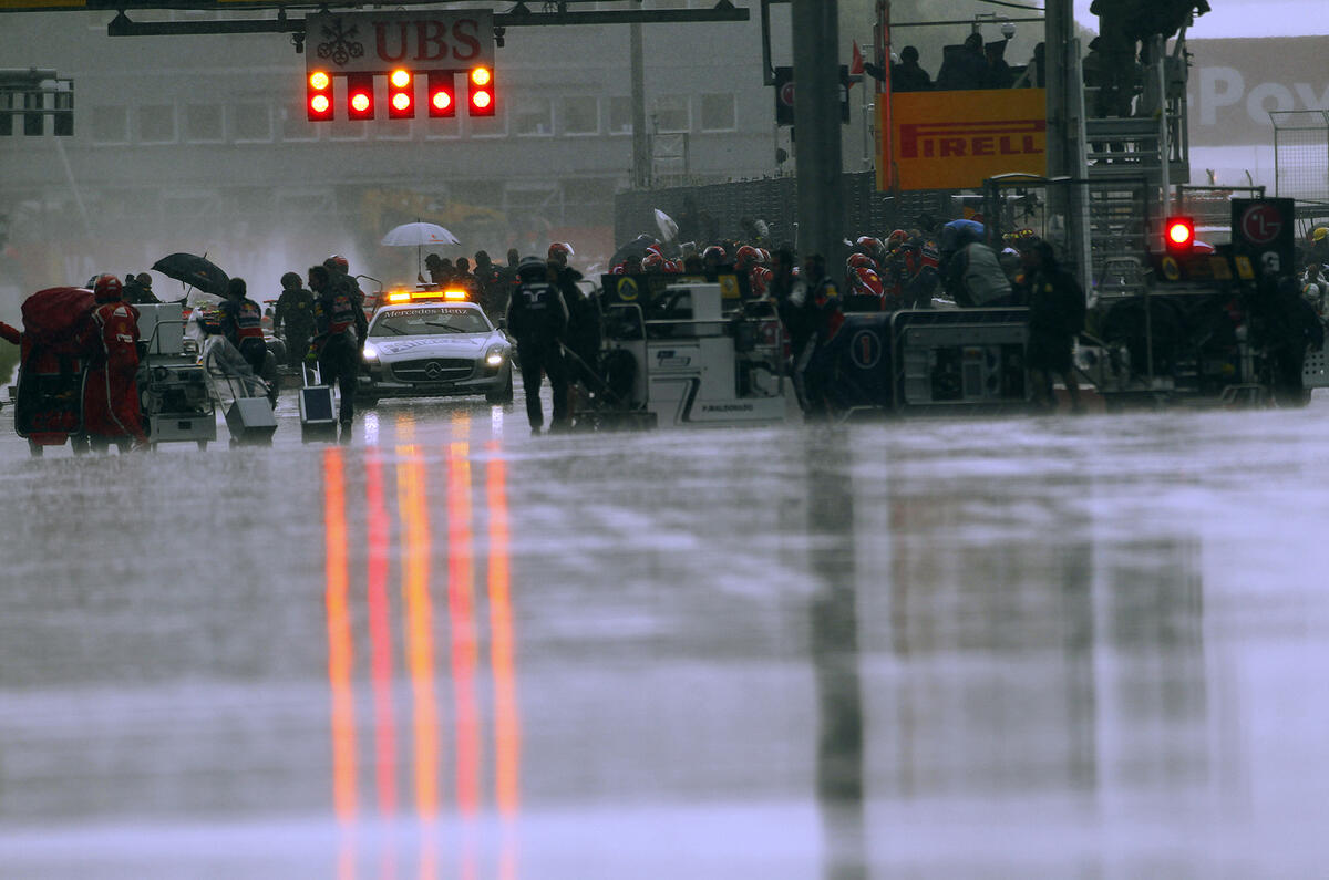 Button triumphs in Canada classic