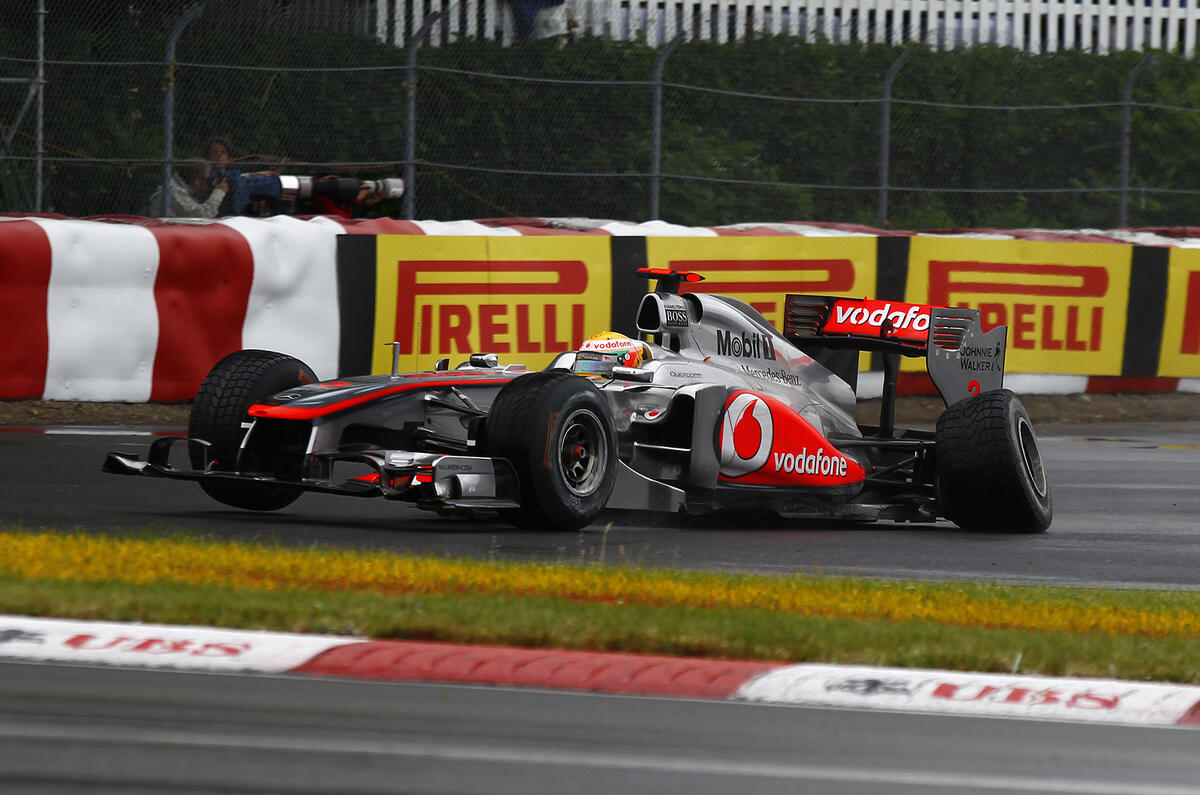Button triumphs in Canada classic