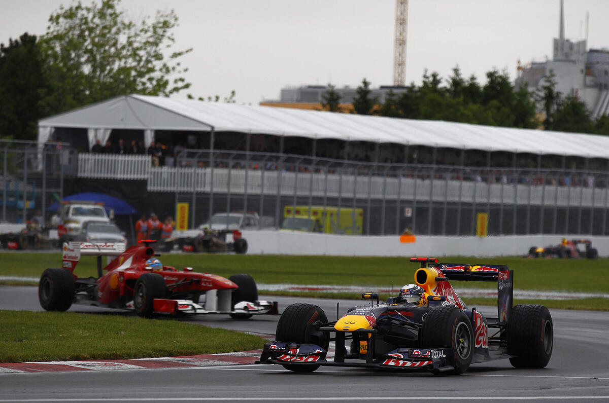 Button triumphs in Canada classic