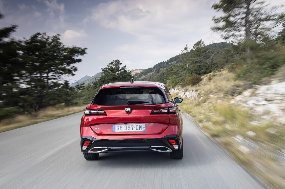 16 Peugeot 308 SW 2021 first drive on road rear 16 Peugeot 308 SW 2021 first drive on road rear