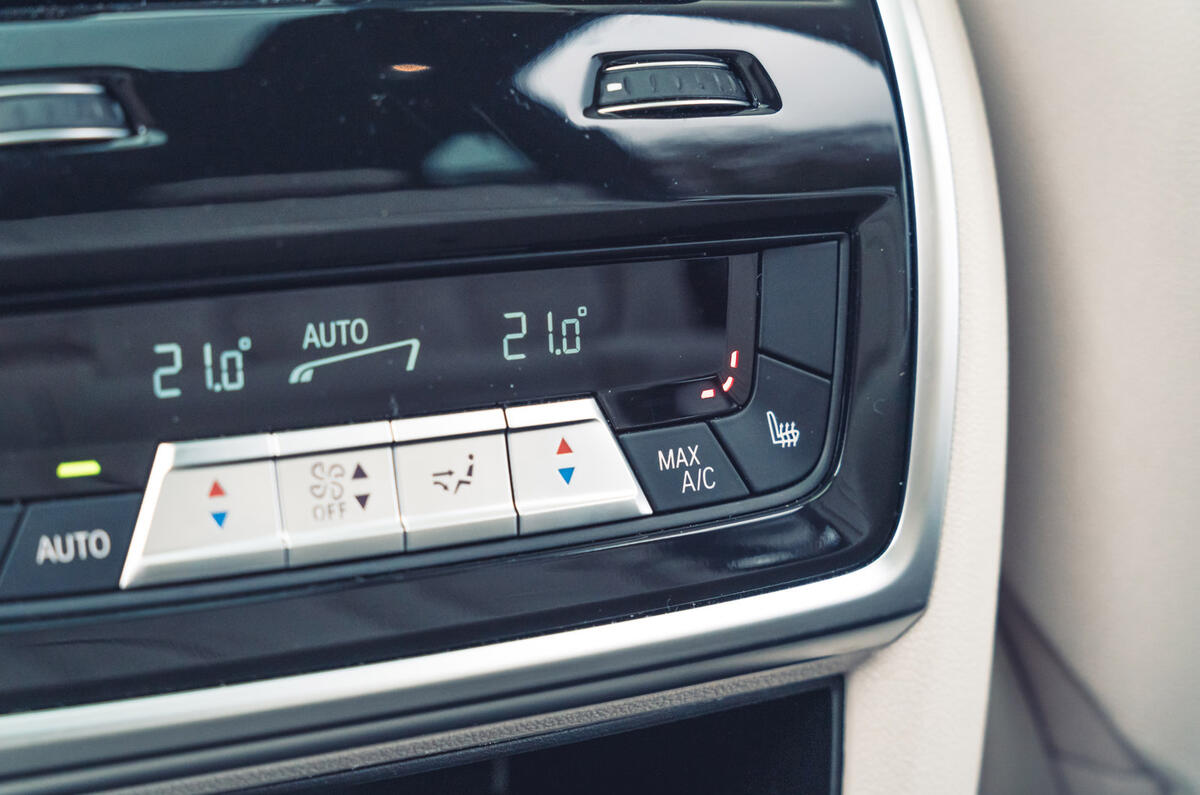 17 BMW X5 xDrive50e review 2024 rear seat climate controls