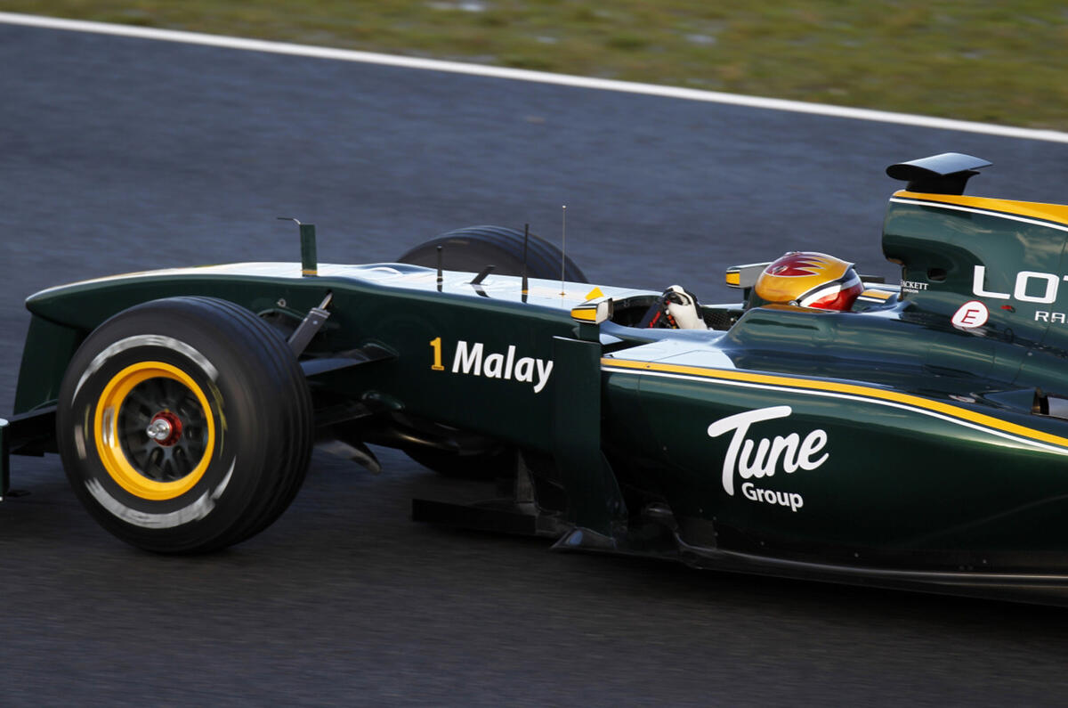 Lotus F1 returns; Vettel fastest