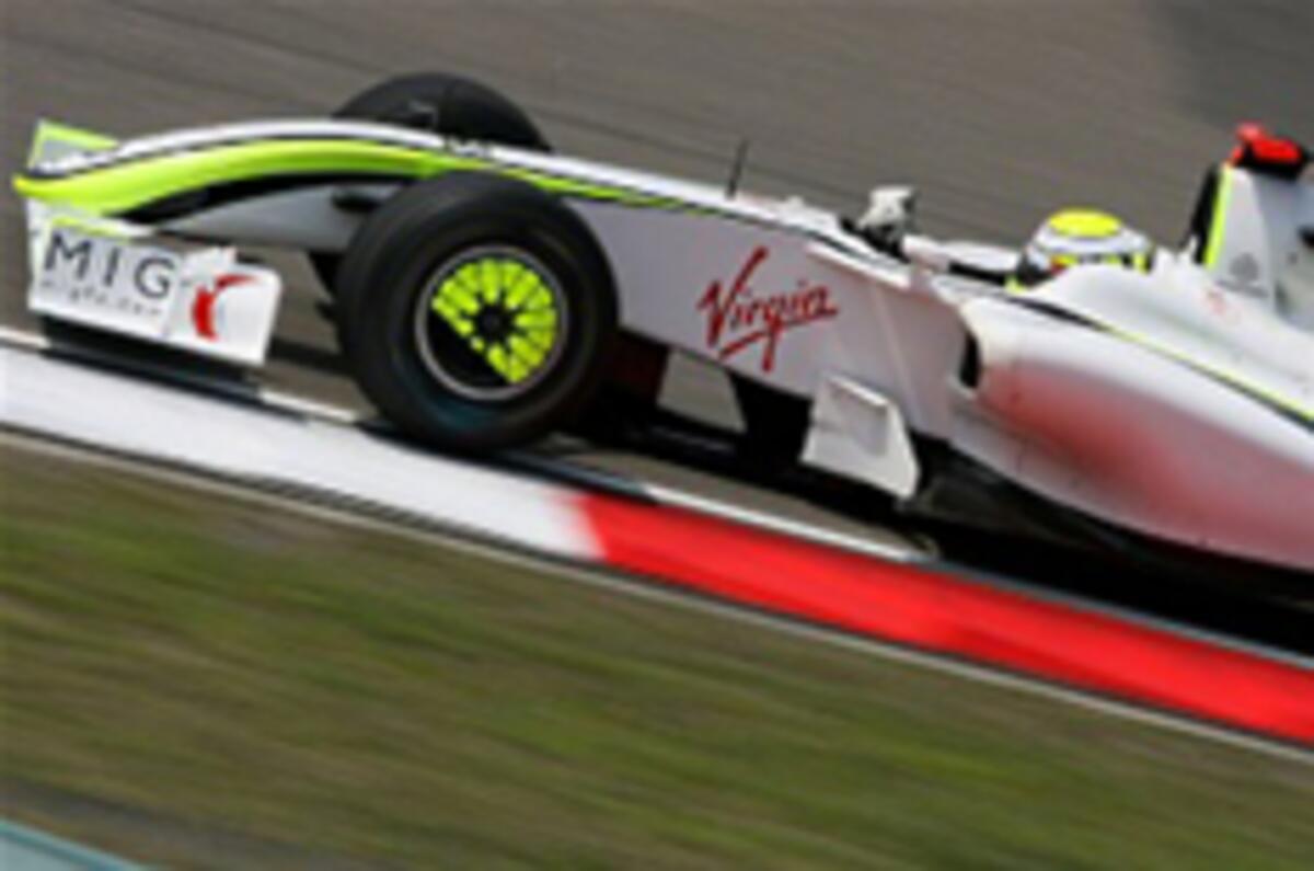 Button tops F1 practice