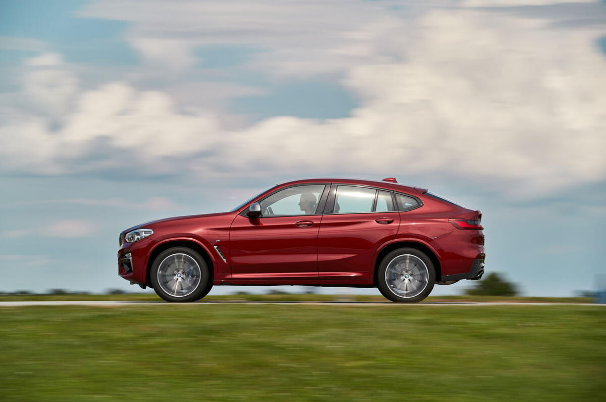 BMW X4 2018 road test review on the road side