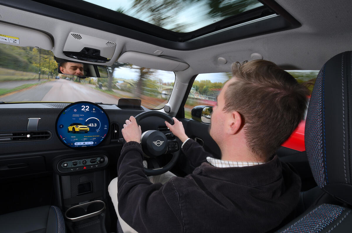2024 Mini Cooper C 3dr in yellow   driving, interior shot 2