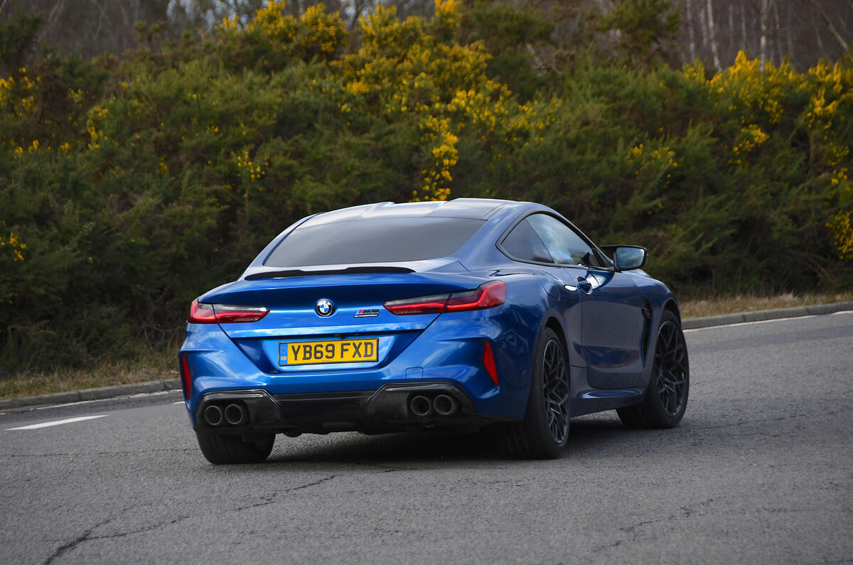 BMW M8 Competition coupe 2020 road test review - on the road rear BMW M8 Competition coupe 2020 road test review - on the road rear