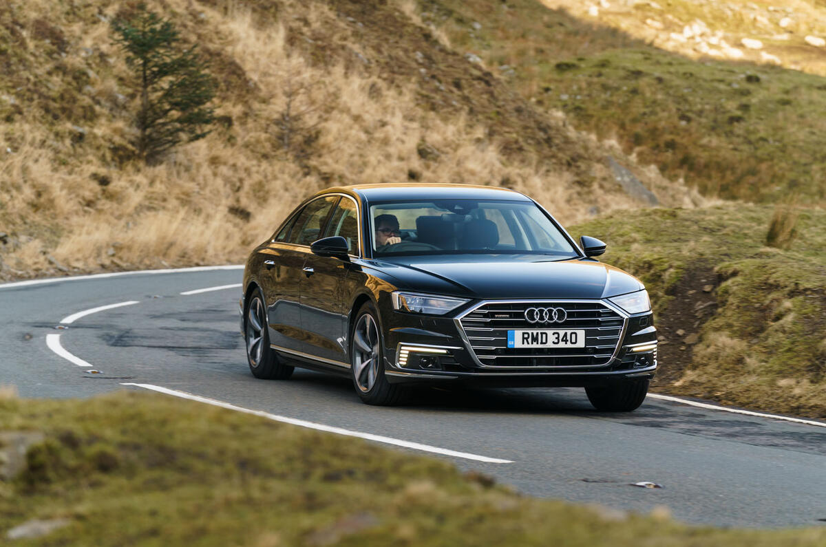 Audi A8 60 TFSIe 2020 road test review - cornering front Audi A8 60 TFSIe 2020 road test review - cornering front