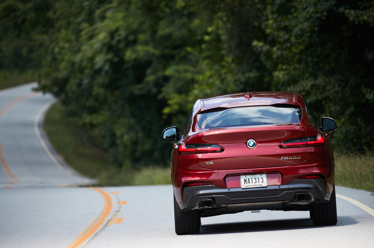 BMW X4 2018 road test review on the road rear