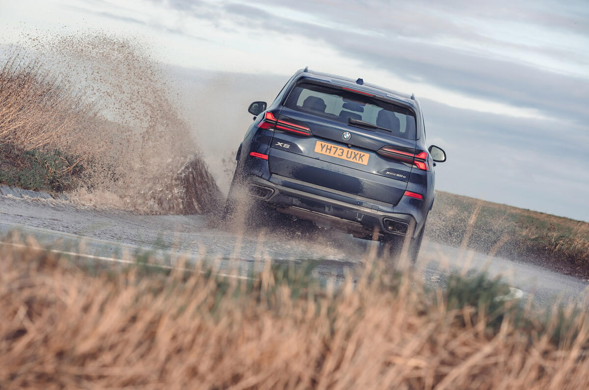 23 BMW X5 xDrive50e review 2024 rear cornering