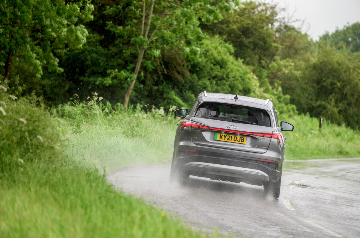 25 Audi Q4 E tron 2021 RT hero on road rear