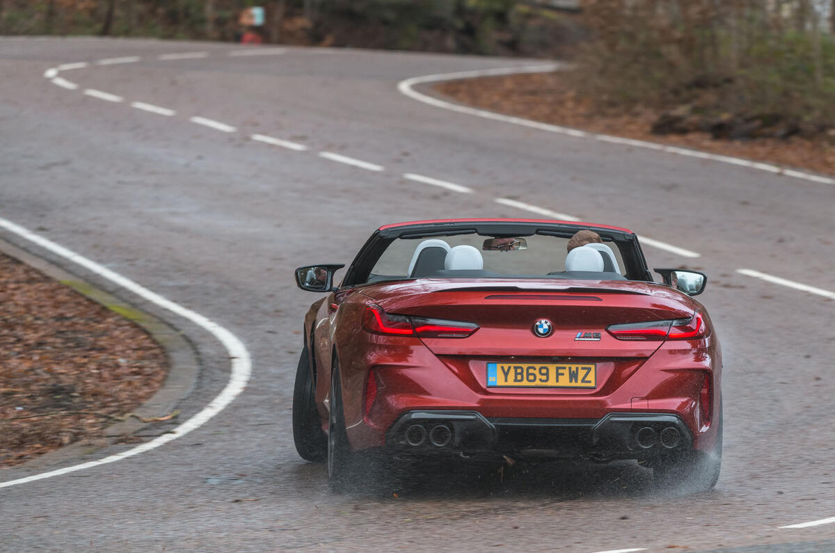 BMW M8 Competition convertible 2020 road test review - cornering rear BMW M8 Competition convertible 2020 road test review - cornering rear