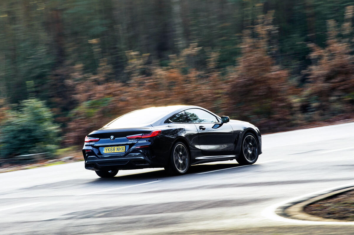 BMW 8 Series Coupé 2019 road test review - cornering rear