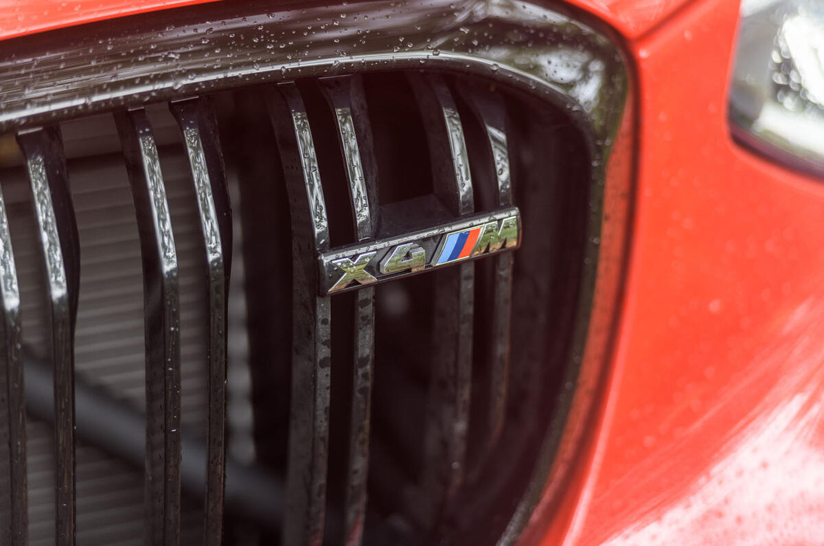 BMW X4 M Competition 2019 road test review - front badge