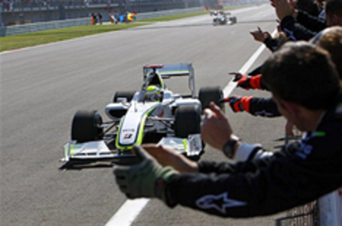 Button eases to victory in Turkey
