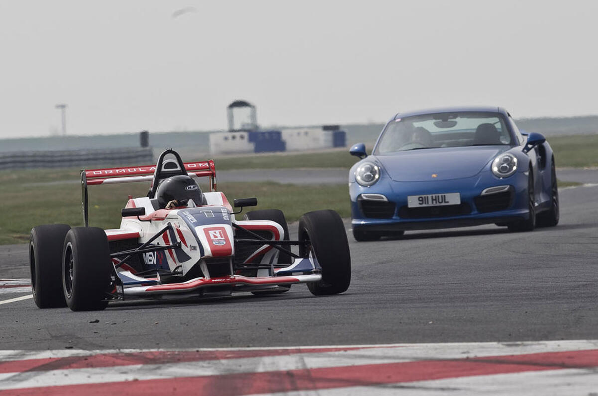 no title Porsche's 911 Turbo S takes on an F4 racer