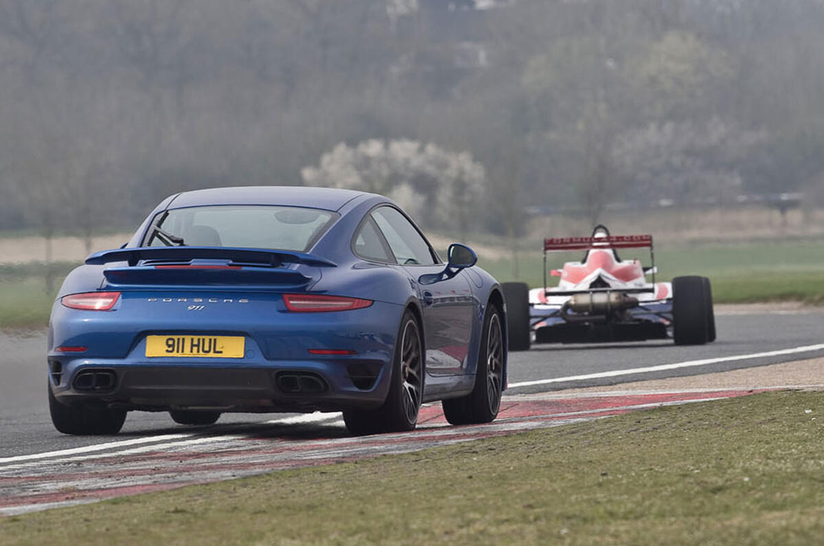 no title Porsche's 911 Turbo S takes on an F4 racer