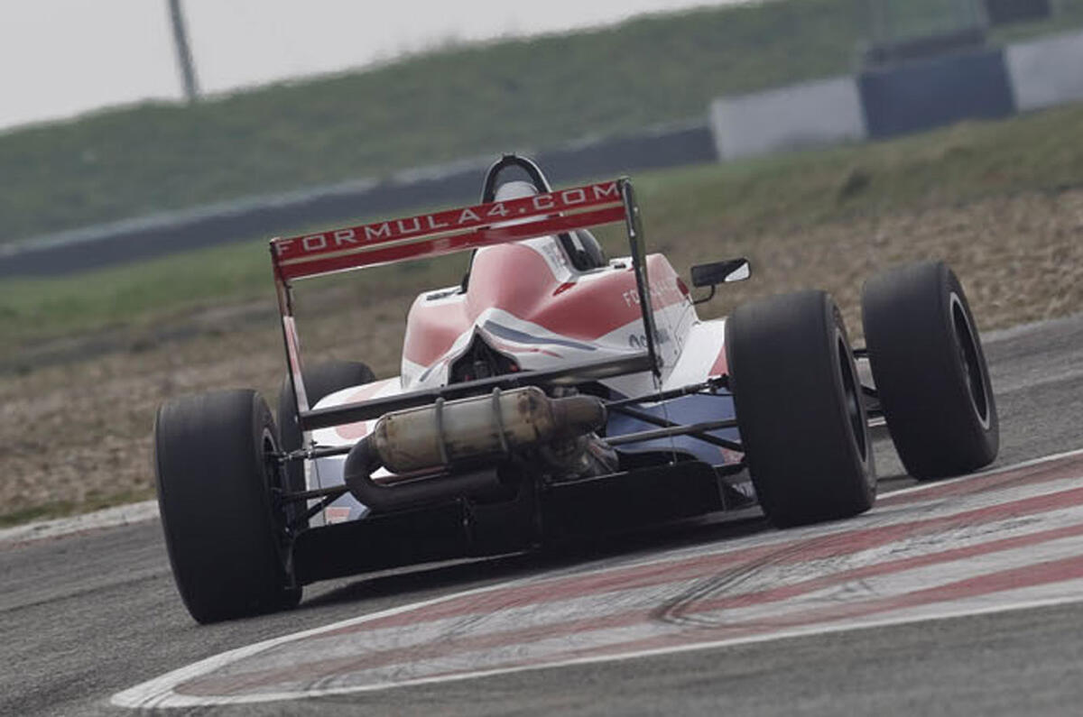 no title Porsche's 911 Turbo S takes on an F4 racer