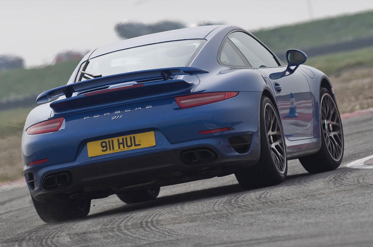 no title Porsche's 911 Turbo S takes on an F4 racer