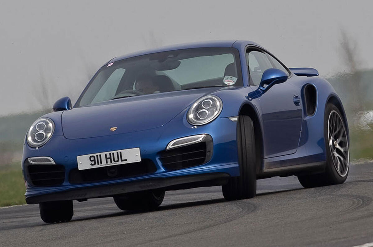 no title Porsche's 911 Turbo S takes on an F4 racer