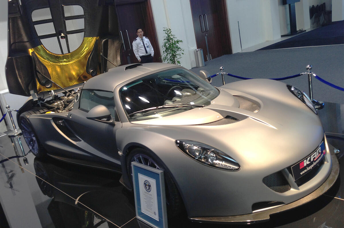 Dubai motor show 2013 show report and gallery